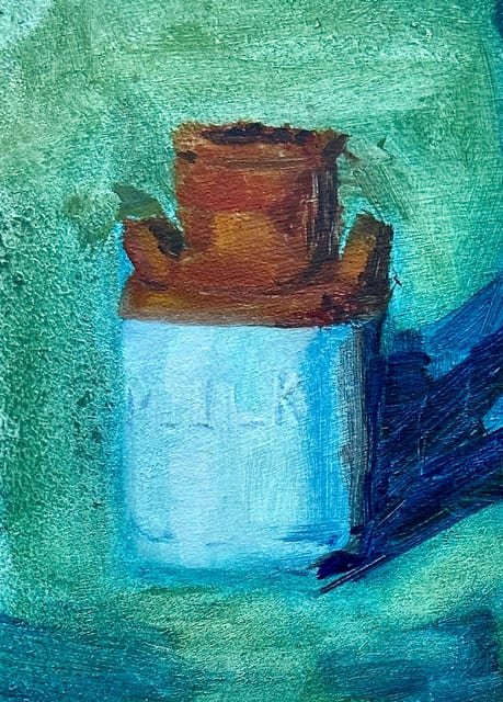 Old Milk Jar on Green
