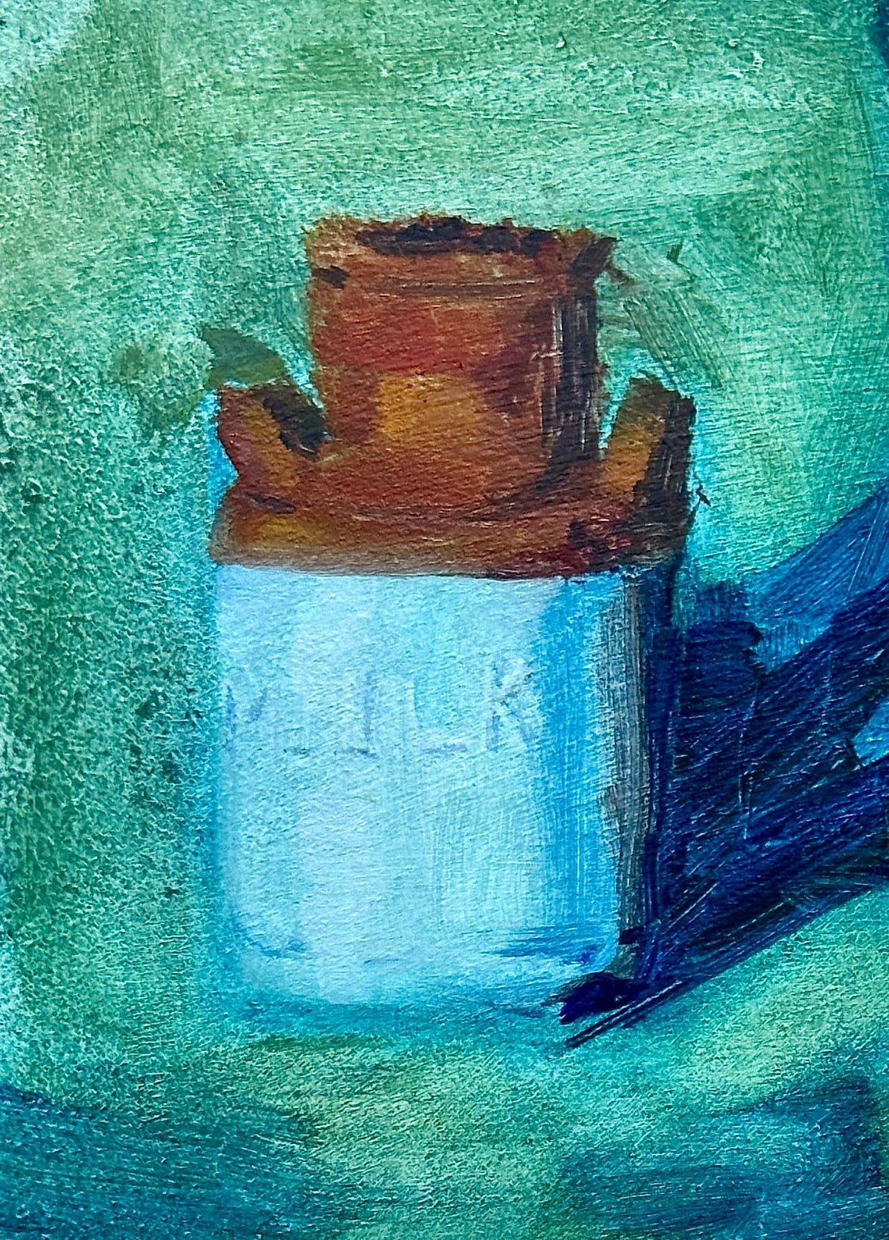 Old Milk Jar on Green